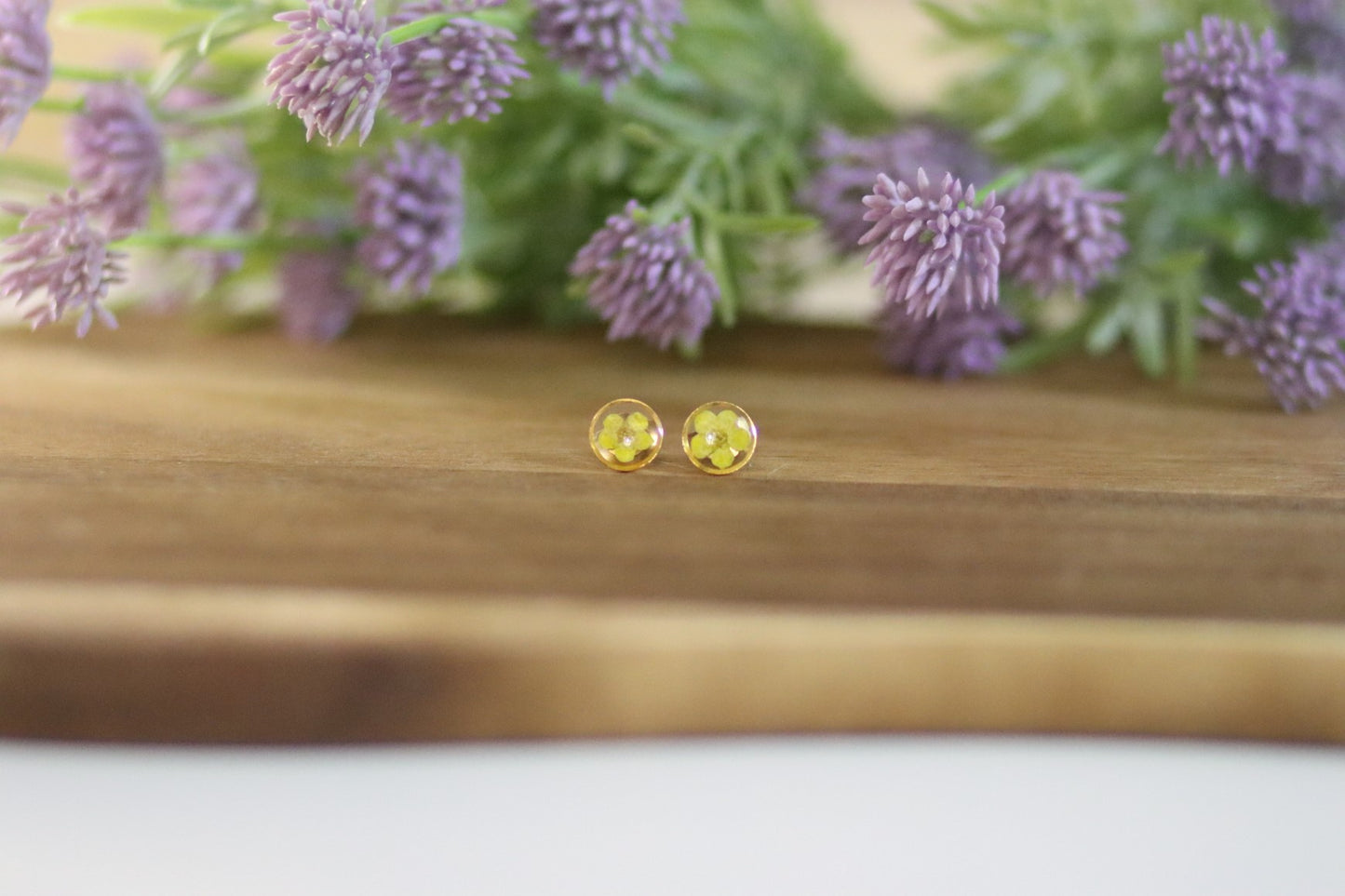 Ohrstecker mit gelber Blüte | transparent | goldfarbener Modeschmuck