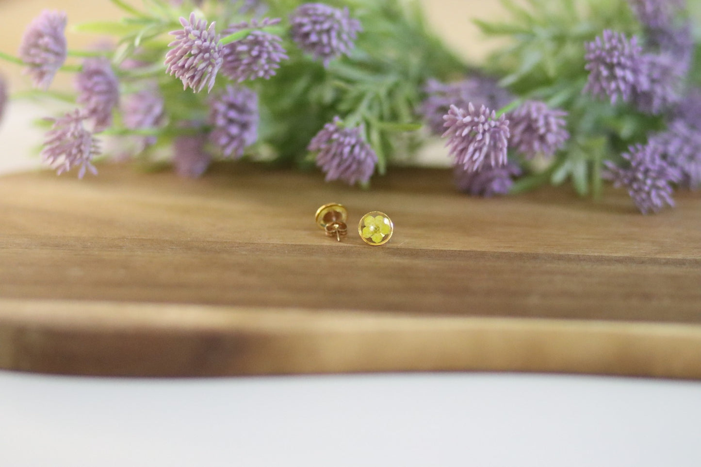 Ohrstecker mit gelber Blüte | transparent | goldfarbener Modeschmuck